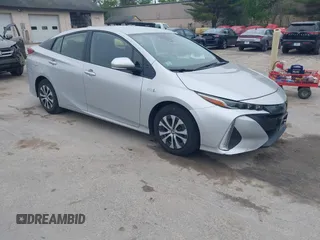2020 Toyota Prius LE z VIN JTDKARFP7L3147014, wystawiony jako IAAI lot #42253715 z przebiegiem 45 151 mil mil oraz . Historia ofert i sprzedaży dostępna na DreamBid. Obrazek 1.