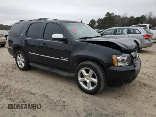2014 Chevrolet Tahoe LTZ z VIN 1GNSCCE04ER156563, wystawiony jako Copart lot #44647735 z przebiegiem 135 849 mil mil oraz Czysty tytuł • Clean title. Historia ofert i sprzedaży dostępna na DreamBid. Obrazek 4.