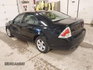 2007 Ford Fusion SE with VIN 3FAHP07147R177289, listed as a IAAI auction lot 41953287 with 218,656 mi miles. Bid and sale history available at carsss.com. Image 3.