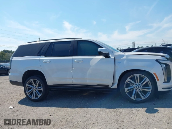2025 Cadillac Escalade z VIN 1GYS9GRL7SR168408, wystawiony jako IAAI lot #41855623 z przebiegiem 1 744 mil mil oraz . Historia ofert i sprzedaży dostępna na DreamBid. Obrazek 13.