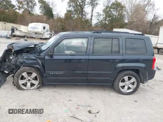 2014 Jeep Patriot Latitude with VIN 1C4NJRFB3ED551622, listed as a IAAI auction lot 40917179 with 109,856 mi miles. Bid and sale history available at carsss.com. Image 14.