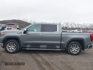 2021 GMC Sierra 1500 SLT z VIN 3GTU9DET8MG413416, wystawiony jako IAAI lot #41935465 z przebiegiem 70 547 mil mil oraz . Historia ofert i sprzedaży dostępna na DreamBid. Obrazek 14.