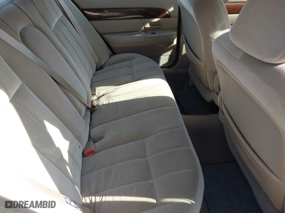 2003 Mercury Grand Marquis GS Convenience with VIN 2MEFM74W43X681774, listed as a IAAI auction lot 42057422 with 218,422 mi miles. Bid and sale history available at carsss.com. Image 8.