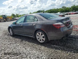 2009 Acura RL Technology z VIN JH4KB26649C001429, wystawiony jako Copart lot #55273505 z przebiegiem 183 047 mil mil oraz Szkoda całkowita • Salvage title. Historia ofert i sprzedaży dostępna na DreamBid. Obrazek 2.