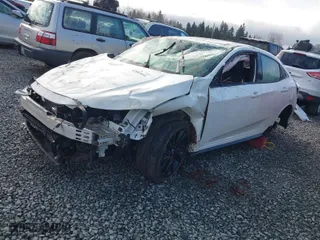 2019 Honda Civic Hatchback Sport Touring with VIN SHHFK7H98KU408264, listed as a IAAI auction lot 41803694 with NaN miles. Bid and sale history available at carsss.com. Image 2.