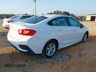 2017 Chevrolet Cruze LT z VIN 1G1BE5SM0H7235078, wystawiony jako IAAI lot #41734625 z przebiegiem 140 548 mil mil oraz . Historia ofert i sprzedaży dostępna na DreamBid. Obrazek 4.