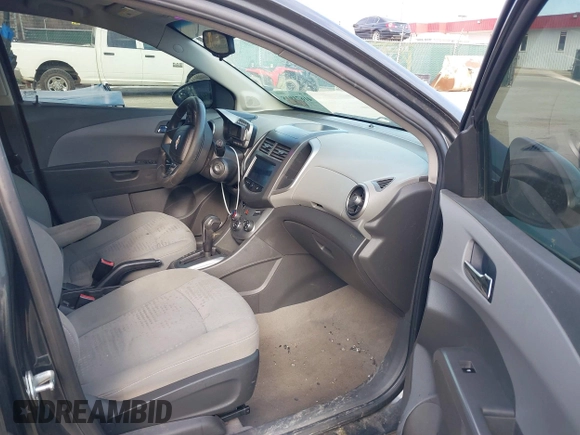 2014 Chevrolet Sonic LT with VIN 1G1JC6SG6E4121407, listed as a IAAI auction lot 41671918 with 137,517 mi miles. Bid and sale history available at carsss.com. Image 5.