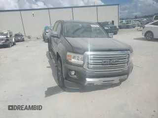 2015 GMC Canyon 2WD SLT with VIN 1GTG5CE31F1263234, listed as a Copart auction lot 76512794 with 113,180 mi miles and Salvage Title. Bid and sale history available at carsss.com. Image 13.