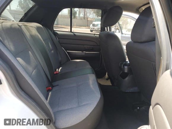 2011 Ford Police Interceptor with VIN 2FABP7BV4BX167977, listed as a Copart auction lot 61819025 with 104,769 mi miles and Salvage title. Bid and sale history available at DreamBid. Image 10.