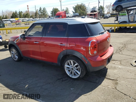 2014 MINI Countryman with VIN WMWZB3C56EWR41819, listed as a Copart auction lot 48149985 with 93,784 mi miles and Salvage Title. Bid and sale history available at DreamBid. Image 2.