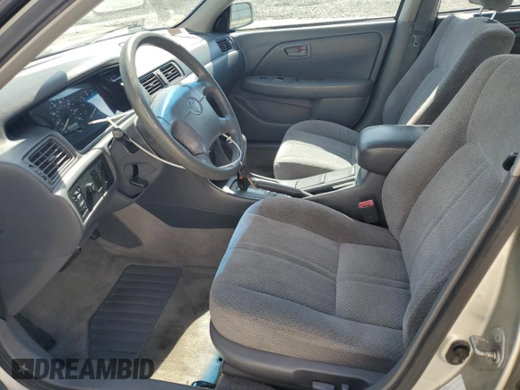2000 Toyota Camry CE with VIN JT2BG22K9Y0520572, listed as a Copart auction lot 51062815 with 130,878 mi miles and Salvage Title. Bid and sale history available at DreamBid. Image 7.