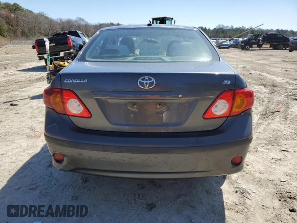 2010 Toyota Corolla with VIN 1NXBU4EEXAZ374677, listed as a Copart auction lot 49790675 with 293,377 mi miles and Clean title. Bid and sale history available at DreamBid. Image 6.