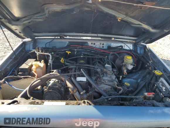 1998 Jeep Cherokee Sport with VIN 1J4FT68S0WL138603, listed as a Copart auction lot 86766454 with 0 mi miles and Salvage Title. Bid and sale history available at carsss.com. Image 12.