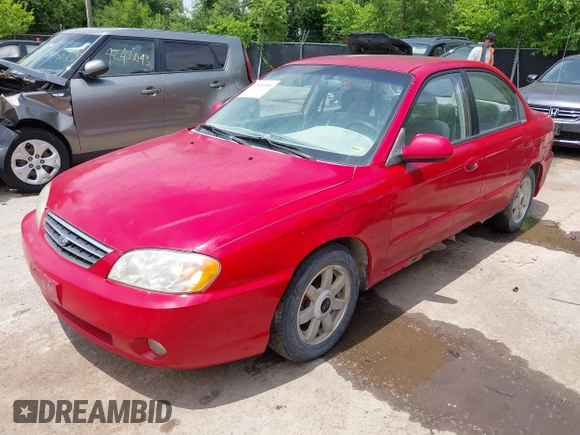 2003 Kia Spectra z VIN KNAFB121335301950, wystawiony jako IAAI lot #42433395 z przebiegiem 101 534 mil mil oraz . Historia ofert i sprzedaży dostępna na DreamBid. Obrazek 2.