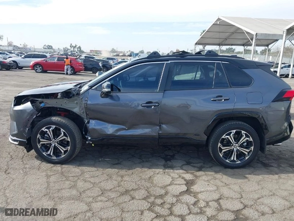 2024 Toyota RAV4 Prime XSE with VIN JTMEB3FV5RD205307, listed as a IAAI auction lot 41228303 with NaN miles. Bid and sale history available at carsss.com. Image 15.