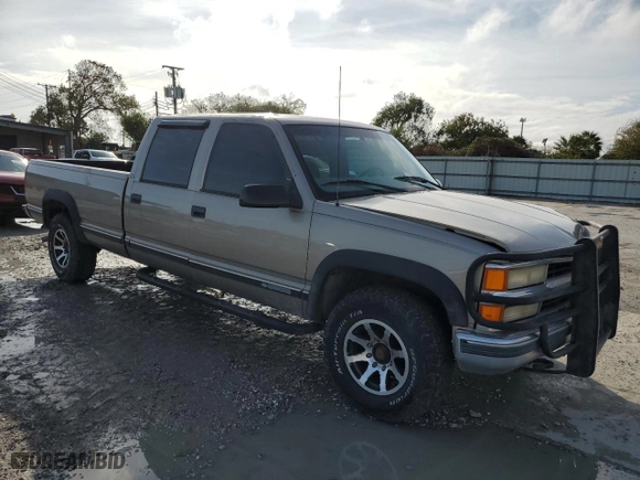 2000 Chevrolet C/K 3500 Crew Cab with VIN 1GCGC33R3YF516072, listed as a Copart auction lot 83587024 with NaN miles and Salvage Title. Bid and sale history available at carsss.com. Image 4.