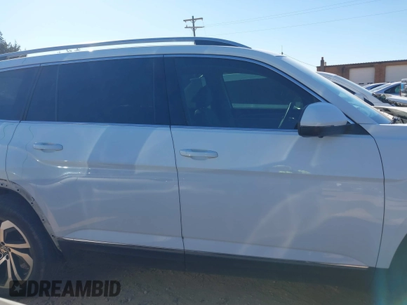2021 Volkswagen Atlas SEL Premium z VIN 1V2TR2CA8MC562198, wystawiony jako IAAI lot #41853528 z przebiegiem 57 413 mil mil oraz . Historia ofert i sprzedaży dostępna na DreamBid. Obrazek 13.