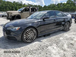 2018 Audi A6 z VIN WAUF8BFC8JN045852, wystawiony jako Copart lot #61085585 z przebiegiem 130 842 mil mil oraz Czysty tytuł • Clean title. Historia ofert i sprzedaży dostępna na DreamBid. Obrazek 1.