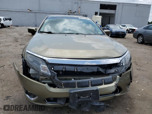 2012 Ford Fusion Hybrid z VIN 3FADP0L33CR210203, wystawiony jako Copart lot #59774345 z przebiegiem 132 152 mil mil oraz Szkoda całkowita • Salvage title. Historia ofert i sprzedaży dostępna na DreamBid. Obrazek 5.