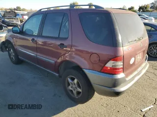 1999 Mercedes-Benz M-Class with VIN 4JGAB54E4XA101754, listed as a Copart auction lot 77903984 with 187,810 mi miles and Salvage Title. Bid and sale history available at carsss.com. Image 2.