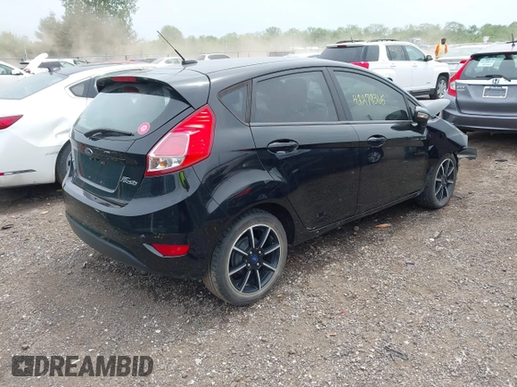 2019 Ford Fiesta SE with VIN 3FADP4EJ9KM135957, listed as a IAAI auction lot 42279365 with 170,696 mi miles and . Bid and sale history available at DreamBid. Image 4.