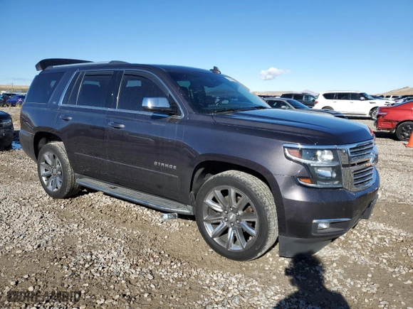 2015 Chevrolet Tahoe LTZ with VIN 1GNSKCKC4FR704080, listed as a Copart auction lot 78803094 with 156,992 mi miles and Salvage Title. Bid and sale history available at carsss.com. Image 4.