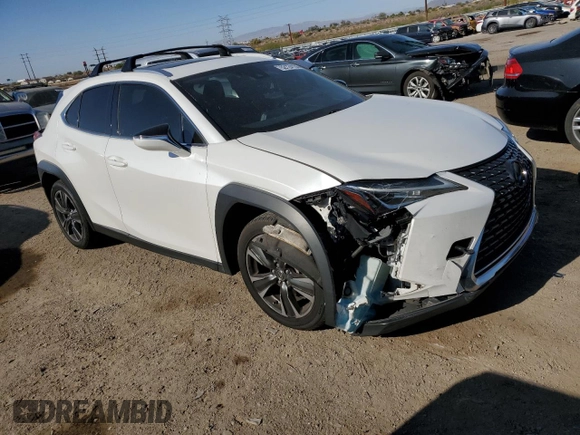 2019 Lexus UX 200 with VIN JTHY3JBH5K2014971, listed as a Copart auction lot 52124135 with 75,121 mi miles and Salvage title. Bid and sale history available at DreamBid. Image 4.