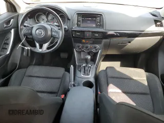 2015 Mazda CX-5 Touring with VIN JM3KE4CY6F0434538, listed as a Copart auction lot 54966145 with 209,447 mi miles and Clean Title. Bid and sale history available at DreamBid. Image 8.