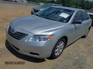 2007 Toyota Camry z VIN 4T1BB46K37U007610, wystawiony jako IAAI lot #42546223 z przebiegiem 252 363 mil mil oraz . Historia ofert i sprzedaży dostępna na DreamBid. Obrazek 2.