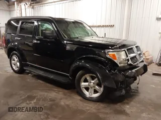 2007 Dodge Nitro SXT with VIN 1D8GU28K67W663621, listed as a IAAI auction lot 41691529 with 211,556 mi miles. Bid and sale history available at carsss.com. Image 1.