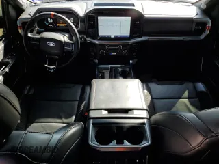 2023 Ford F-150 Raptor with VIN 1FTFW1RG7PFB77277, listed as a Copart auction lot 51096445 with 43,917 mi miles and Salvage Title. Bid and sale history available at DreamBid. Image 8.