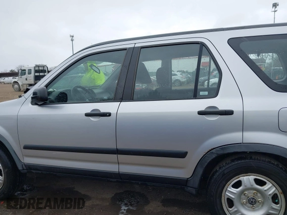 2006 Honda CR-V LX with VIN JHLRD78536C035954, listed as a IAAI auction lot 42043220 with 250,337 mi miles and . Bid and sale history available at carsss.com. Image 14.