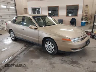 2002 Saturn LS z VIN 1G8JU54F52Y585354, wystawiony jako IAAI lot #41680106 z przebiegiem 90 431 mil mil oraz . Historia ofert i sprzedaży dostępna na DreamBid. Obrazek 1.