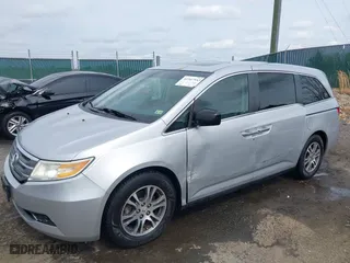 2011 Honda Odyssey EX-L with VIN 5FNRL5H69BB031983, listed as a IAAI auction lot 41947443 with 148,111 mi miles. Bid and sale history available at carsss.com. Image 19.