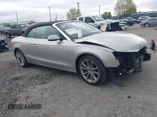 2014 Audi A5 Premium Plus z VIN WAULFAFH7EN001894, wystawiony jako IAAI lot #42082669 z przebiegiem 78 624 mil mil oraz . Historia ofert i sprzedaży dostępna na DreamBid. Obrazek 1.