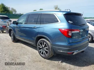 2020 Honda Pilot Touring 8-Passenger with VIN 5FNYF6H93LB034009, listed as a IAAI auction lot 42090993 with 73,325 mi miles and . Bid and sale history available at carsss.com. Image 3.