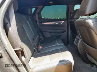 2020 Cadillac XT5 Luxury FWD z VIN 1GYKNAR47LZ173823, wystawiony jako Copart lot #56770025 z przebiegiem 74 192 mil mil oraz Szkoda całkowita • Salvage title. Historia ofert i sprzedaży dostępna na DreamBid. Obrazek 11.