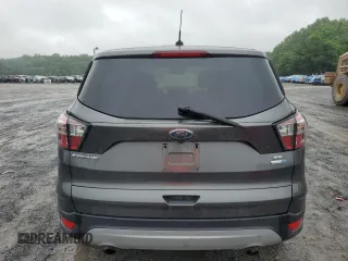 2017 Ford Escape SE z VIN 1FMCU9GD4HUE68604, wystawiony jako Copart lot #61170775 z przebiegiem 152 286 mil mil oraz Czysty tytuł • Clean title. Historia ofert i sprzedaży dostępna na DreamBid. Obrazek 6.