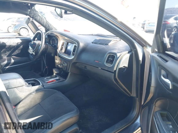 2022 Dodge Charger Scat Pack Widebody with VIN 2C3CDXGJ1NH204130, listed as a IAAI auction lot 41392893 with 9,515 mi miles and . Bid and sale history available at DreamBid. Image 5.