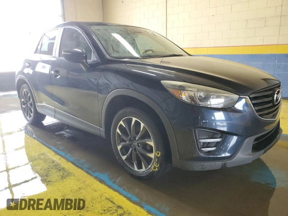 2016 Mazda CX-5 Grand Touring with VIN JM3KE4DY0G0813499, listed as a Copart auction lot 54174805 with 116,709 mi miles and Clean Title. Bid and sale history available at carsss.com. Image 4.