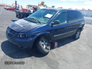2005 Dodge Caravan SXT with VIN 1D8GP45R65B280660, listed as a IAAI auction lot 42169027 with 246,407 mi miles and . Bid and sale history available at carsss.com. Image 2.