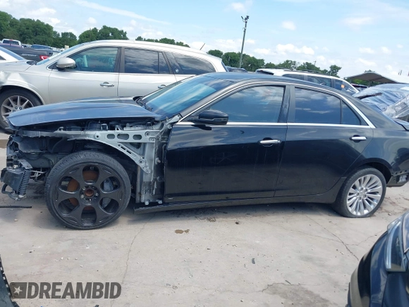 2014 Cadillac CTS Vsport RWD z VIN 1G6AU5S84E0149790, wystawiony jako IAAI lot #42369928 z przebiegiem 96 715 mil mil oraz . Historia ofert i sprzedaży dostępna na DreamBid. Obrazek 14.