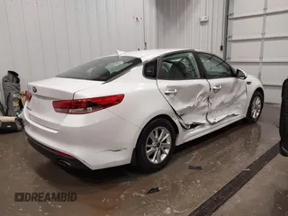 2016 Kia Optima LX with VIN 5XXGT4L38GG048180, listed as a IAAI auction lot 41923650 with 58,018 mi miles. Bid and sale history available at carsss.com. Image 4.