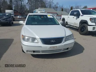 2009 Hyundai Azera Limited z VIN KMHFC46F99A368183, wystawiony jako IAAI lot #41769940 z przebiegiem 144 339 mil mil oraz . Historia ofert i sprzedaży dostępna na DreamBid. Obrazek 13.