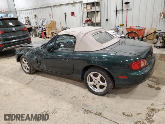 2002 Mazda MX-5 Miata Cloth z VIN JM1NB353820230635, wystawiony jako Copart lot #47834345 z przebiegiem 149 549 mil mil oraz Nie do naprawy • Non repairable. Historia ofert i sprzedaży dostępna na DreamBid. Obrazek 2.