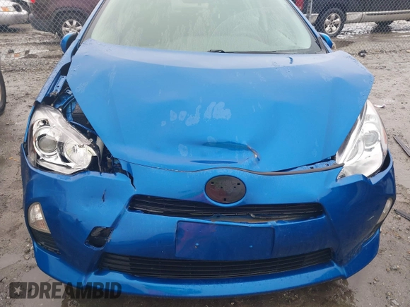 2014 Toyota Prius One z VIN JTDKDTB34E1571983, wystawiony jako IAAI lot #41760657 z przebiegiem 237 497 mil mil oraz . Historia ofert i sprzedaży dostępna na DreamBid. Obrazek 6.