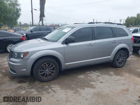 2018 Dodge Journey SE with VIN 3C4PDCAB1JT141295, listed as a IAAI auction lot 42098218 with 110,691 mi miles. Bid and sale history available at carsss.com. Image 14.