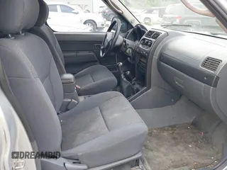 2002 Nissan Frontier XE z VIN 1N6ED26Y42C364634, wystawiony jako IAAI lot #42664934 z przebiegiem 235 730 mil mil oraz . Historia ofert i sprzedaży dostępna na DreamBid. Obrazek 5.
