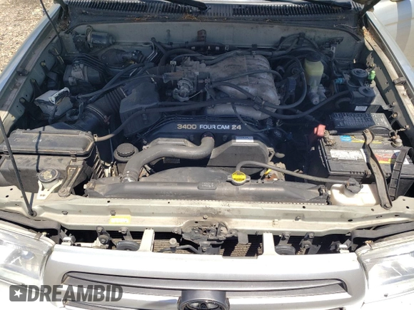 2000 Toyota 4Runner SR5 z VIN JT3HN86R0Y0298459, wystawiony jako Copart lot #58188415 z przebiegiem 138 312 mil mil oraz Czysty tytuł • Clean title. Historia ofert i sprzedaży dostępna na DreamBid. Obrazek 12.