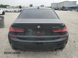 2020 BMW 3 Series M340i with VIN 3MW5U7J01L8B26649, listed as a Copart auction lot 62209814 with 49,731 mi miles and Salvage Title. Bid and sale history available at carsss.com. Image 6.